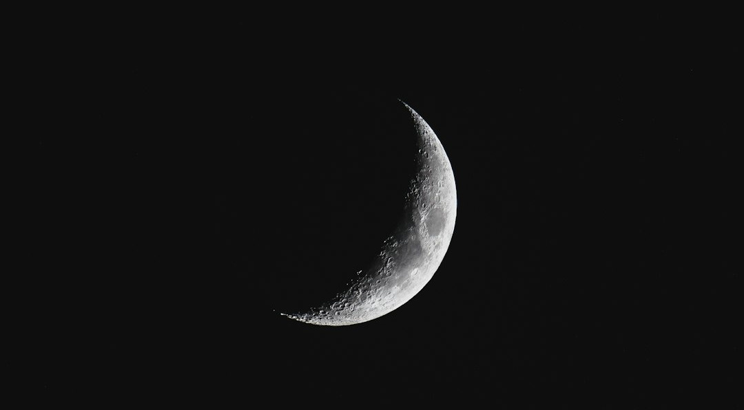 closeup photography of crescent moon closeup photography of crescent moon