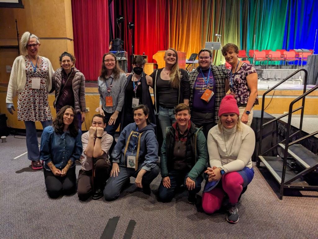 12 queer folx at a conference for queer Christians