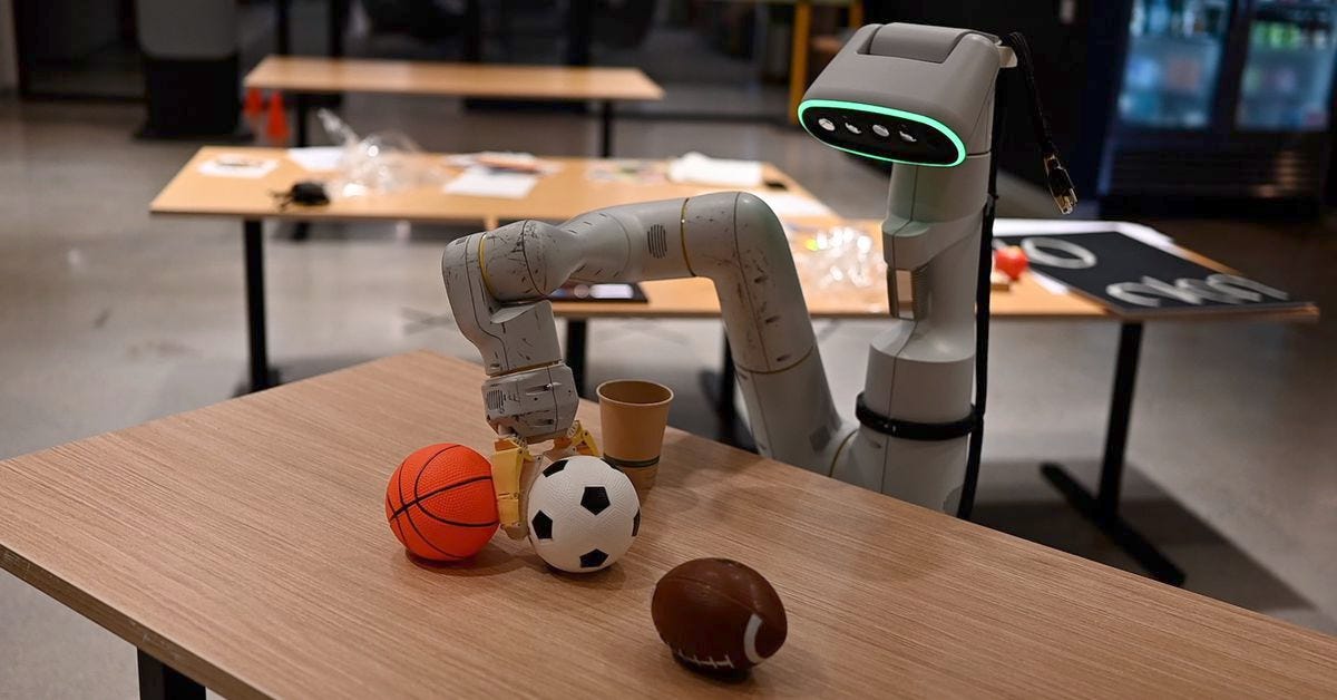 A robot arm moving objects in a Google office.
