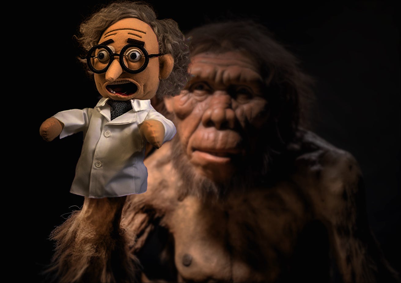 ancient human ancestor holding hand puppet of a modern human
