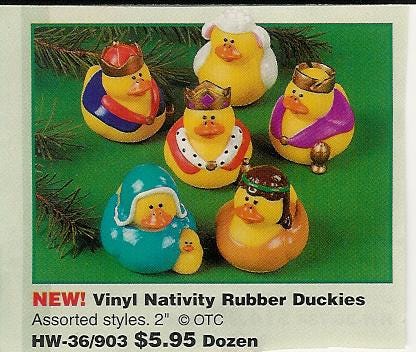 an advertisement for a set of rubber duckies designed to resemble a nativity scene