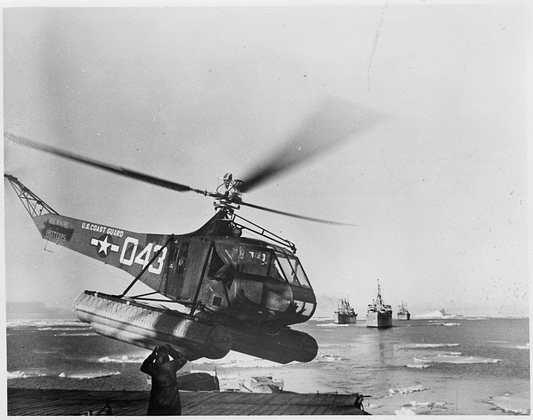 Pic of helicopter landing on aircraft carry during Operation Highjump