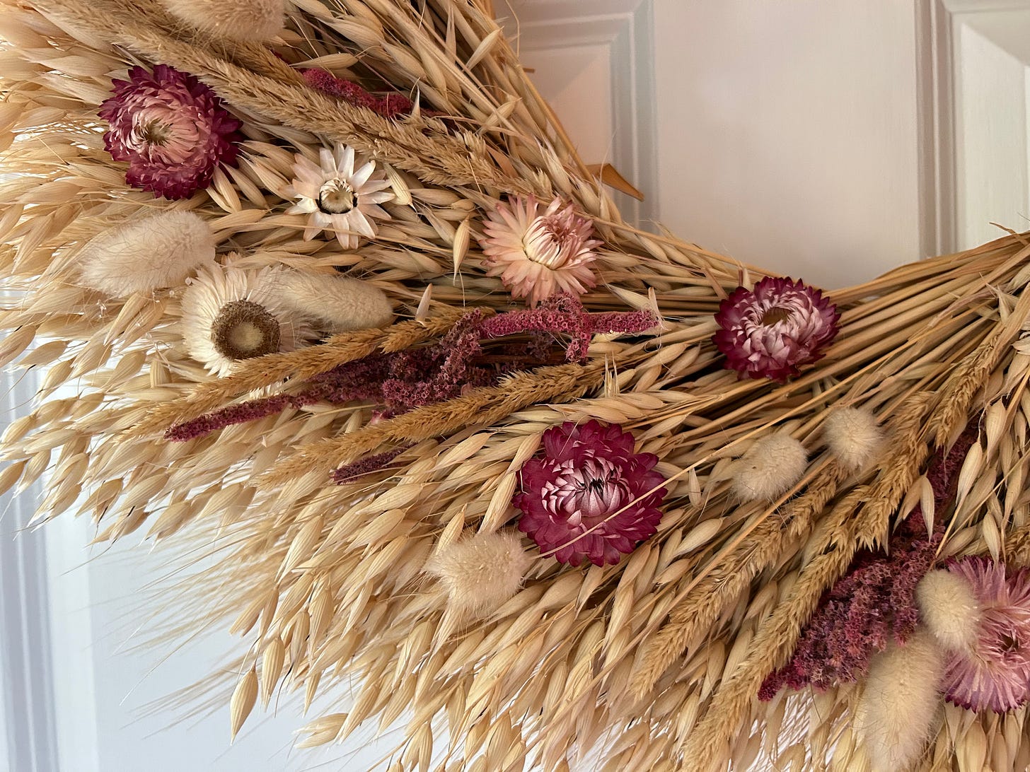 straw wreath with strawflowers