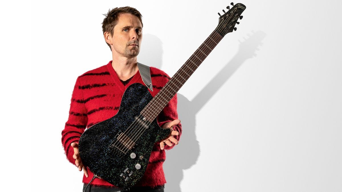 Matt Bellamy with his seven string Manson Guitar