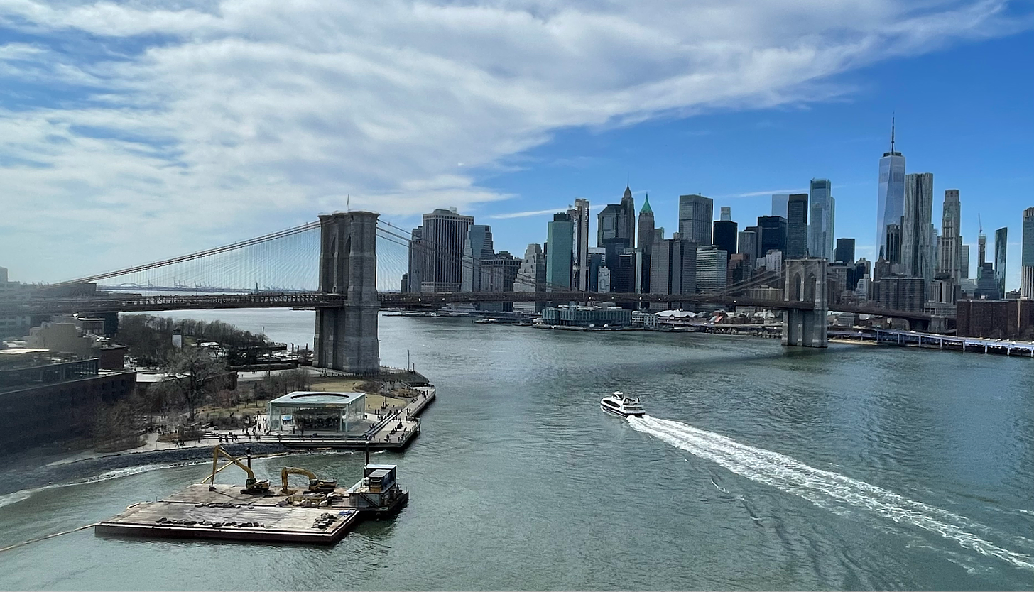 Brooklyn Bridge full span and lower Manhattan.