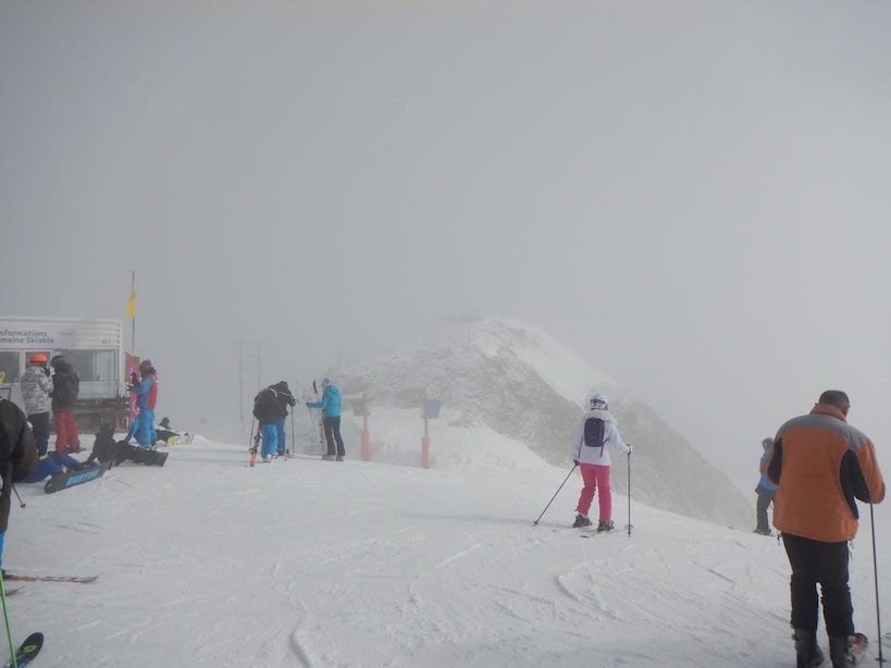 A grey flat light day skiing