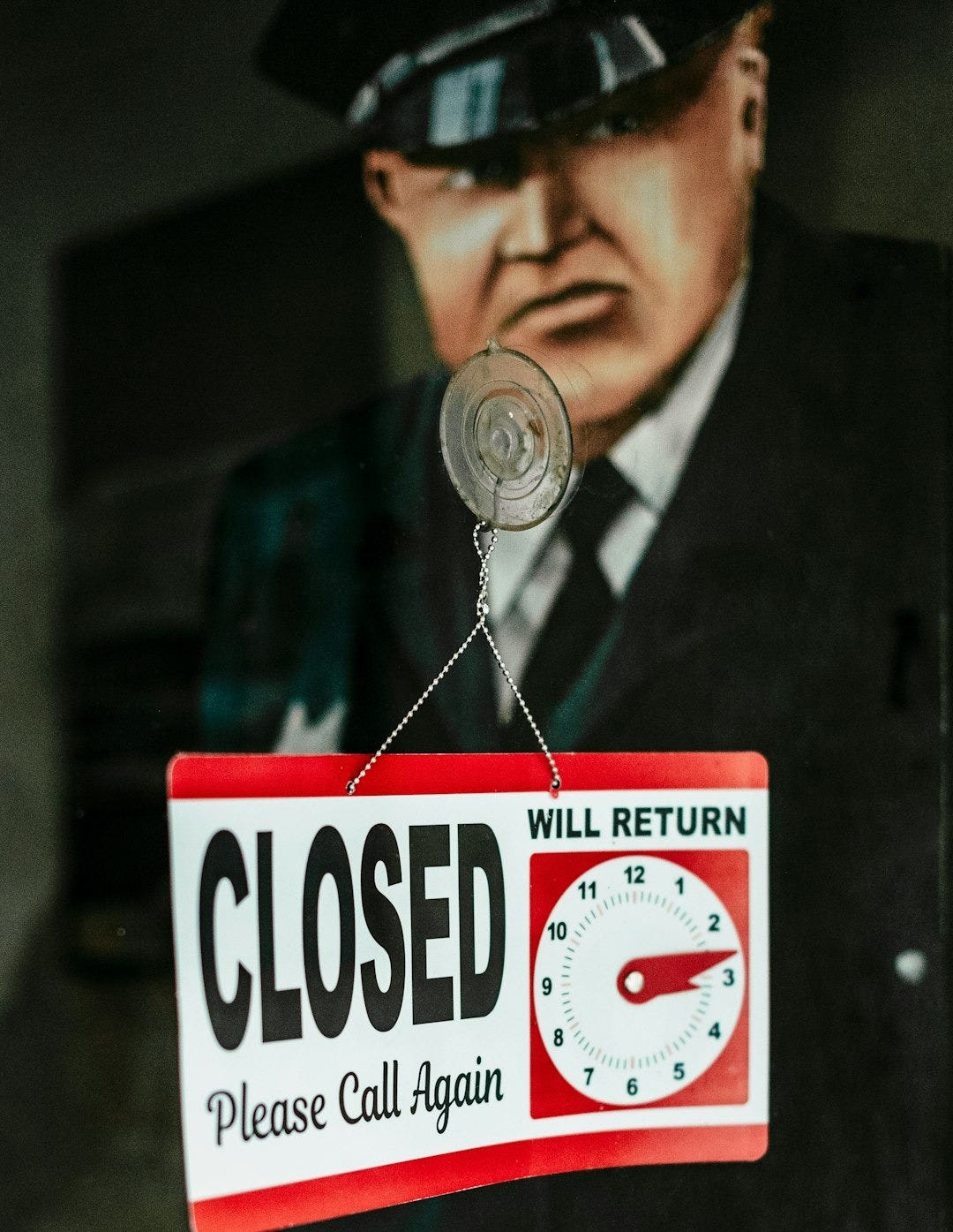 A close up of a sign on a door A close up of a sign on a door