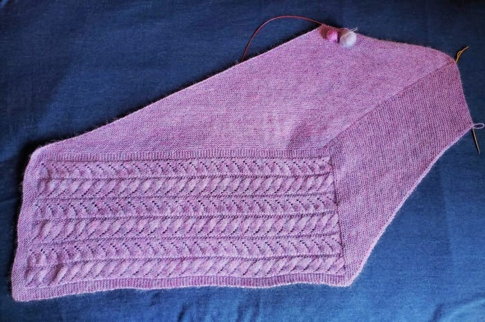 the garter stitch section of my Chasing light shawl halfway complete. There are two small balls of yarn left. 