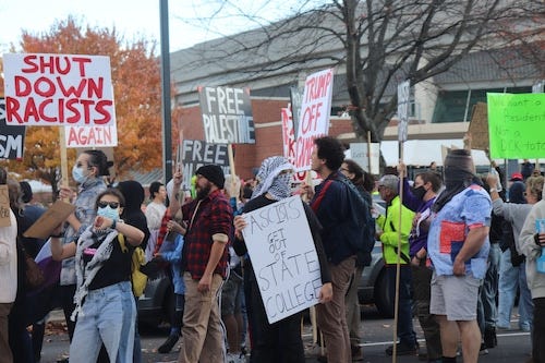 Protesters march before Trump rally in State College