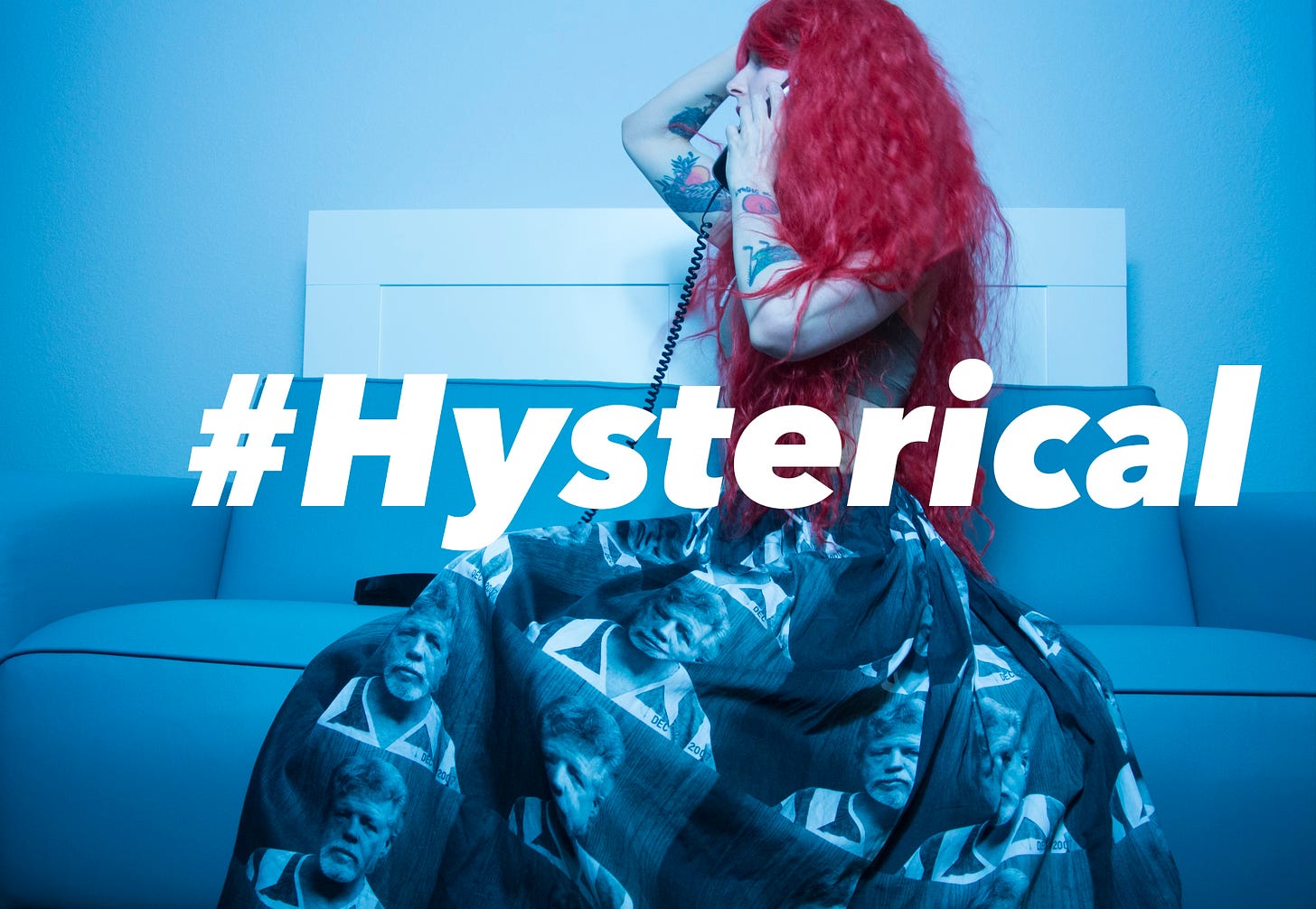 Karrie wearing a long red wig and a skirt printed with their brother's booking photo, striking a dramatic pose with one hand on forehead while on a telephone call. They are seared on a blue leather couch and the lighting is also blue. They wear an army green bra top. Overlaid text reads: #Hysterical