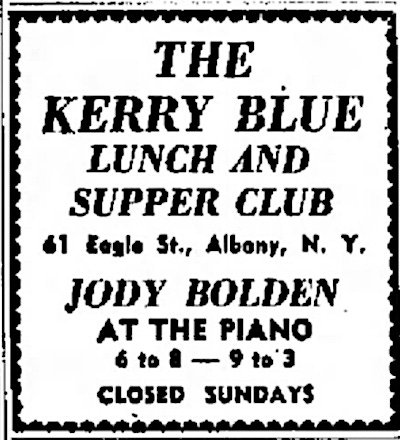 A black-and-white vintage newspaper ad has a scalloped-edge decorative trim. The text reads: THE KERRY BLUE LUNCH AND SUPPER CLUB. 61 Eagle St., Albany, N.Y. JODY BOLDEN AT THE PIANO. 6 to 8 - 9 to 3. CLOSED SUNDAYS.