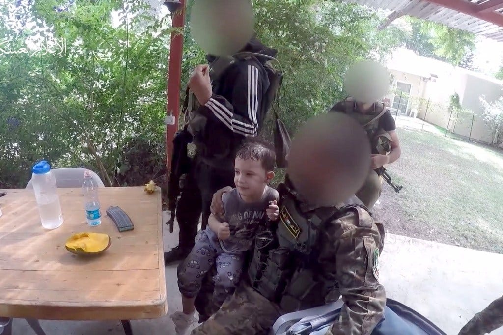 A newly released Hamas video shows two kidnapped Israeli children interacting with their captors.