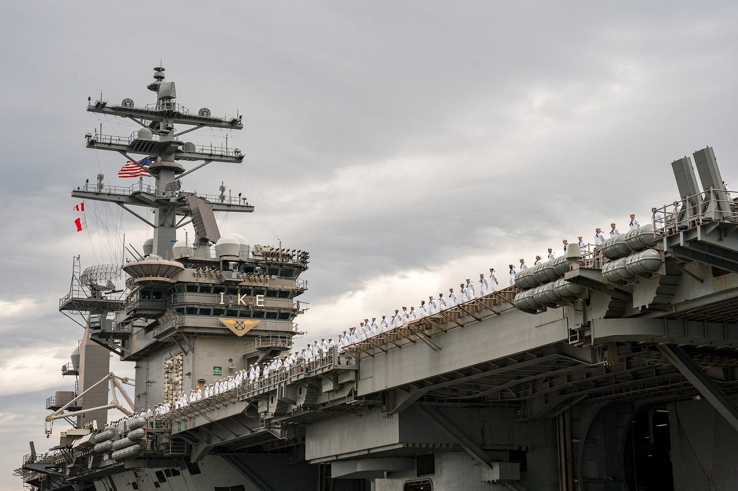 The U.S. Navy Nimitz-class aircraft carrier USS Dwight D. Eisenhower deploys from Naval Station Norfolk