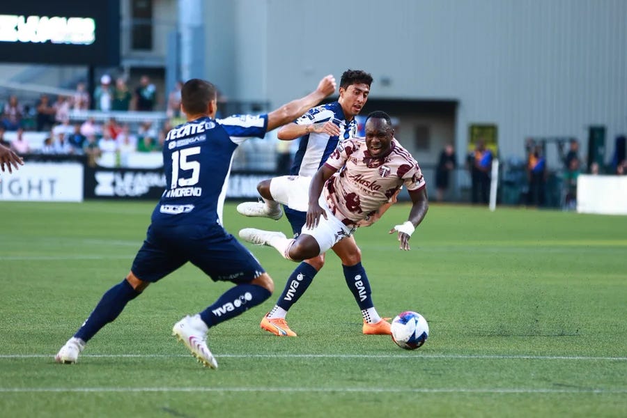 Franck Boli battles for the ball