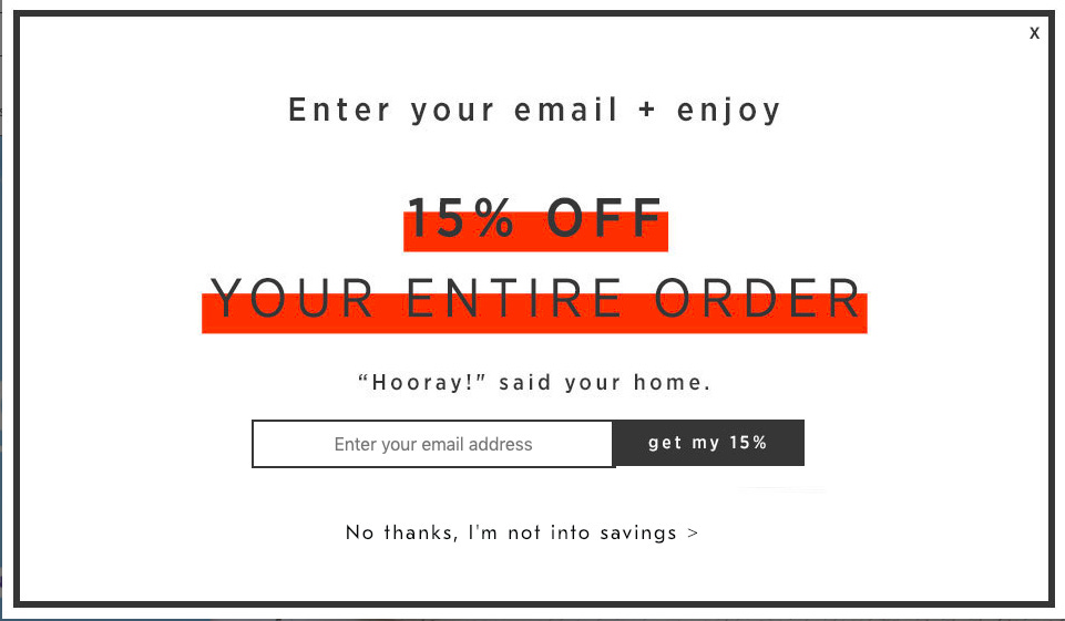 Example of a modal using confirmshaming. The user is asked to share their email to get a discount. The decline option says: "No thanks, I'm not into savings.