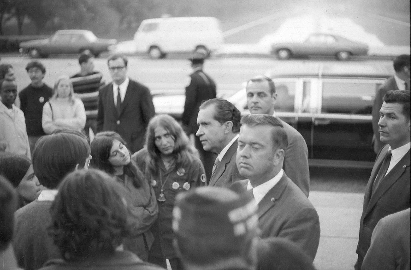 r/HistoryPorn - Nixon meeting with protesters at the Lincoln Memorial after announcing the bombing of Cambodia, early morning, May 9, 1970. White House records show he didn't sleep that night. [1300 x 800]
