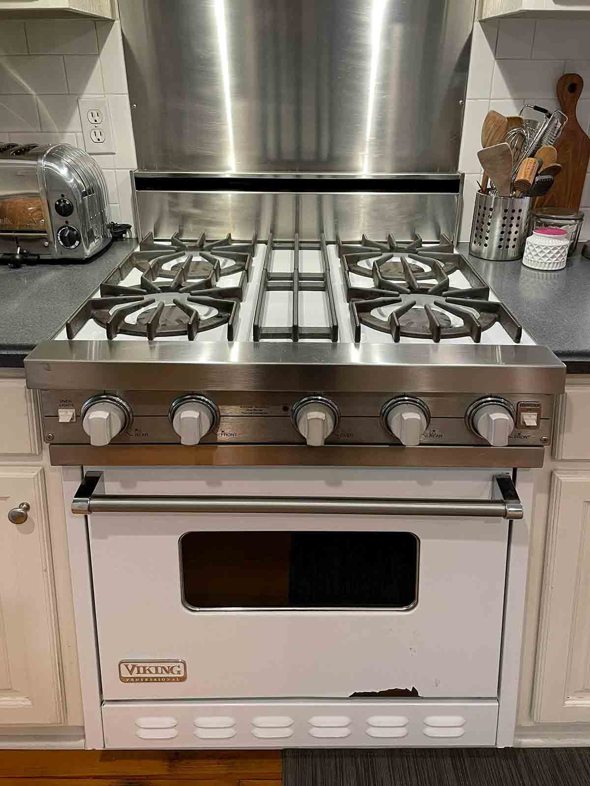 A white enamel Viking stove named Thor.