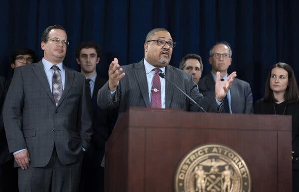 Alvin Bragg speaking at a podium. 