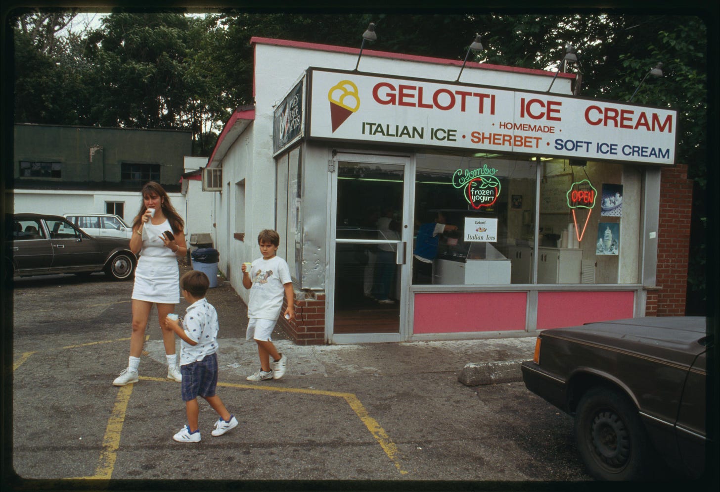 people in front of ice cream shop