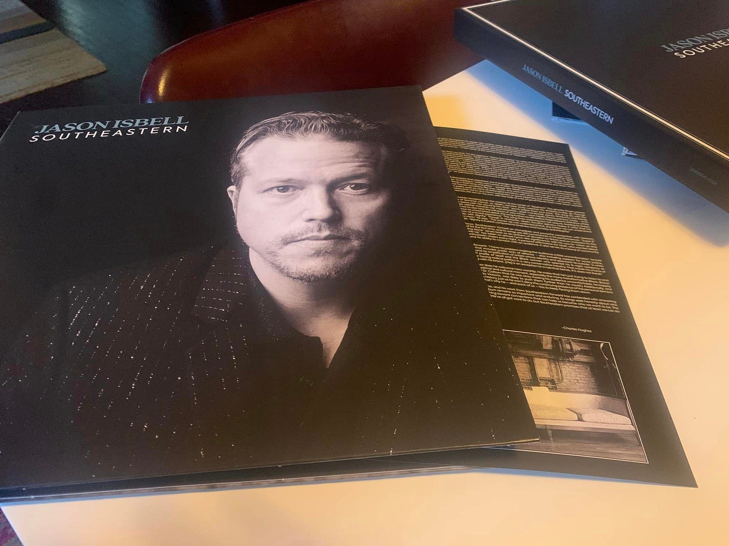 The cover of Jason Isbell’s reissue of Southeastern, with an insert sheet sticking out the flap.