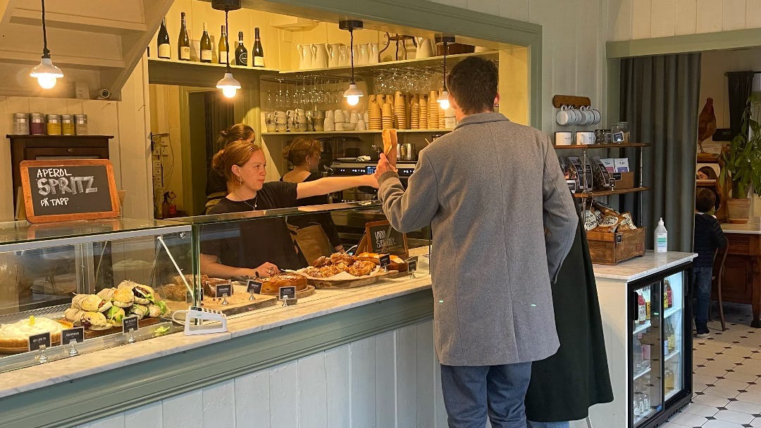 customers order coffee in the cafe