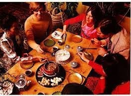 vintage ad family around a fondue pot 1970s fondue raclette cheese fondue