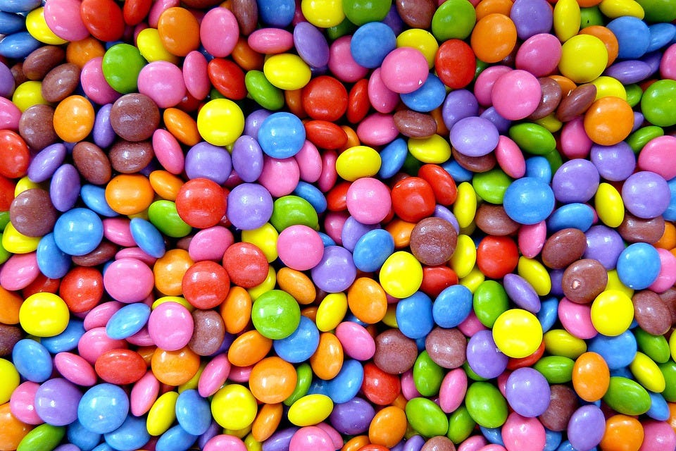 Smarties. Hundreds of them in all their different colours.
