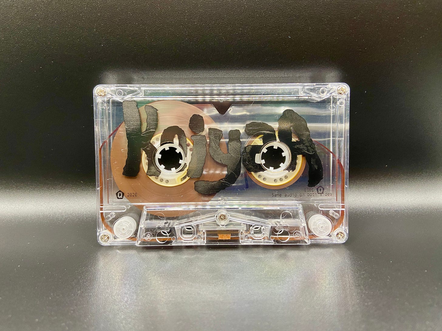 a clear cassette with the name keiyaA on it.