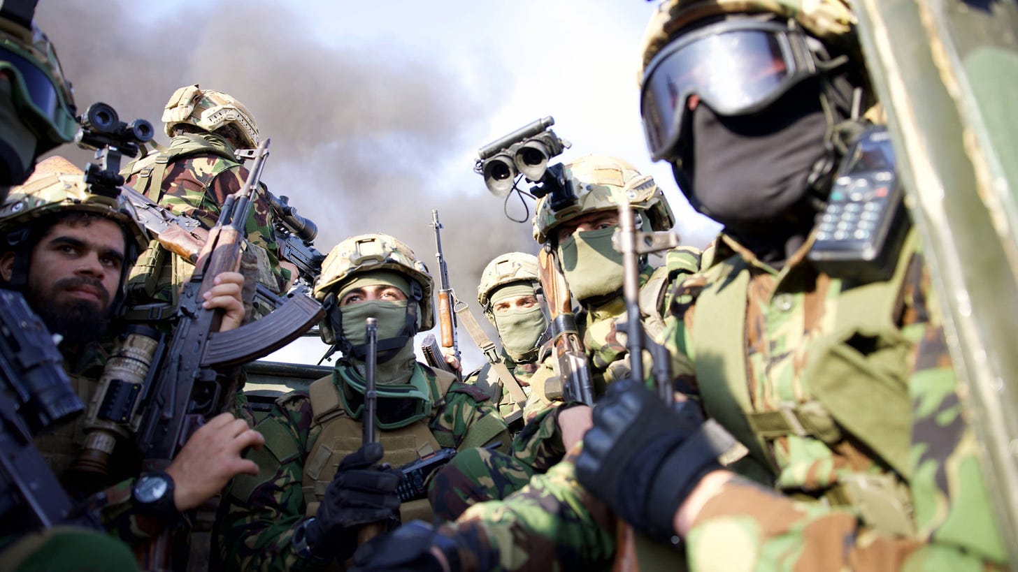 Syrian rebel forces gather in the Aleppo province near Base 46 during a military operation against Syrian and Iranian forces on 27 November 2024 (Mohamed Aldaher/MEE)