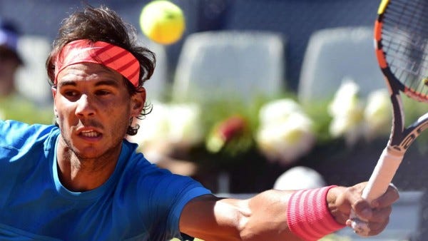 rafael nadal beats grigor dimitrov moves to 2015 madrid open semi finals