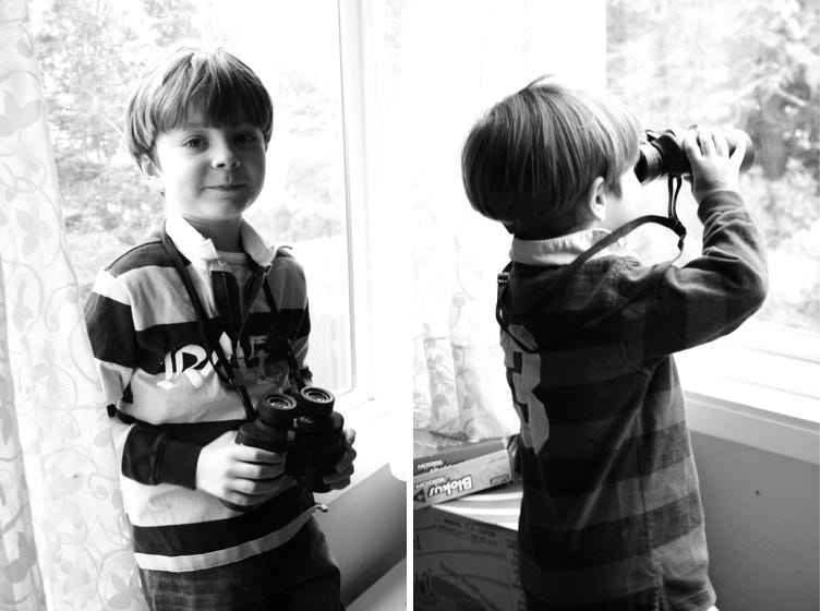 Two young boys with binoculars 