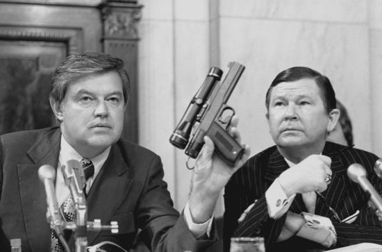 Frank Church holds CIA poison dart gun in 1975, learn more in the church oversight committee pdf