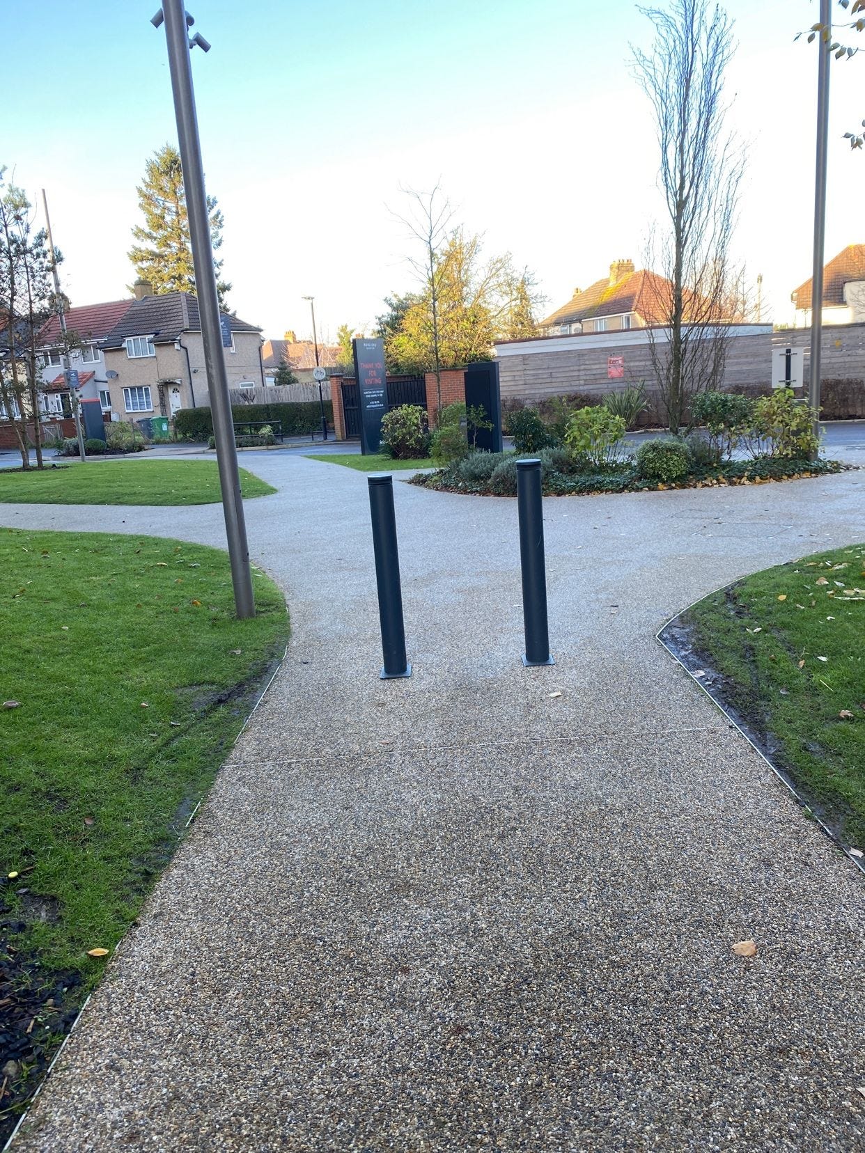 Image of how the bollards initially were positioned outside my apartment building - very close together and not accessible.