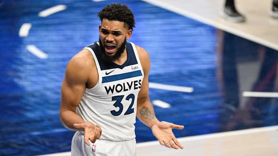 Minnesota Timberwolves center Karl-Anthony Towns reacts after being called for a foul during the third quarter against the Dallas Mavericks in game four of the Western Conference finals for the 2024 NBA playoffs at American Airlines Center. | Jerome Miron-Imagn Images