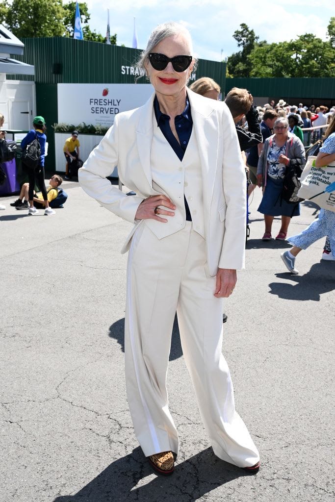 Elizabeth McGovern wore a white three-piece suit with a navy shirt baselayer on day three.