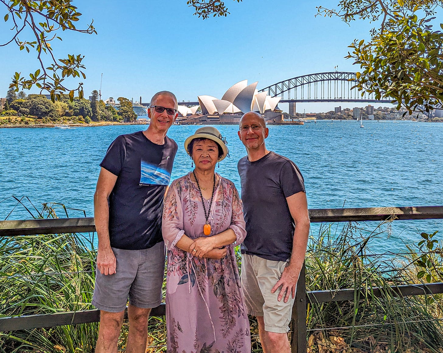Brent and Michael posing with Chinese Mary Poppins with Opera House behind us. 