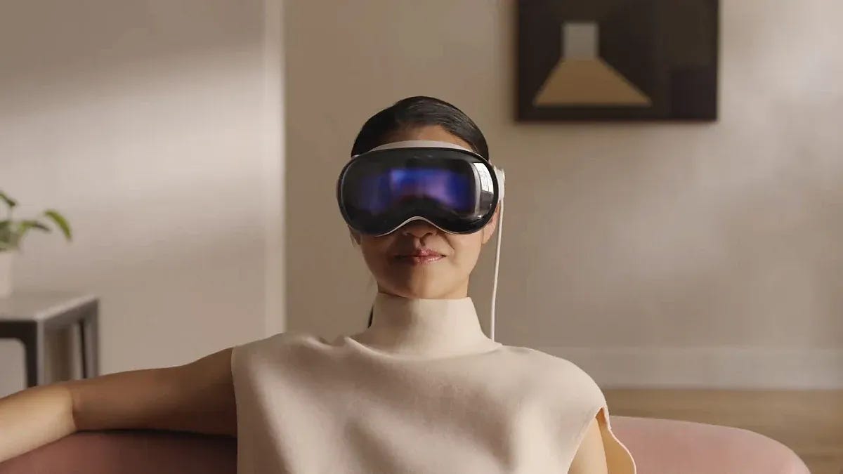 Apple Vision Pro will allow other people to see that a user is engaged in a virtual environment on its front screen.. Apple Vision Pro will allow other people to see that a user is engaged in a virtual environment on its front screen..