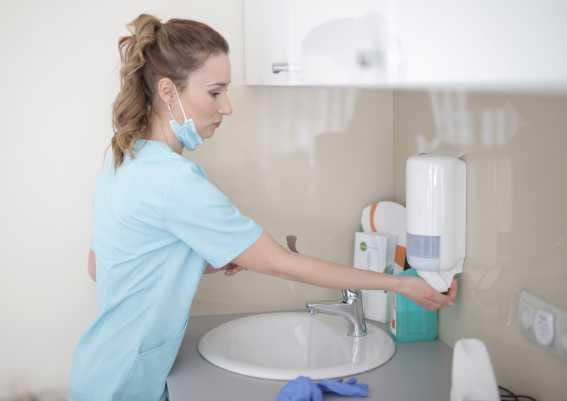 woman washing her hands