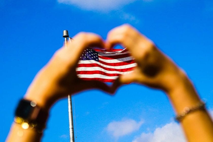 human hands and us flag