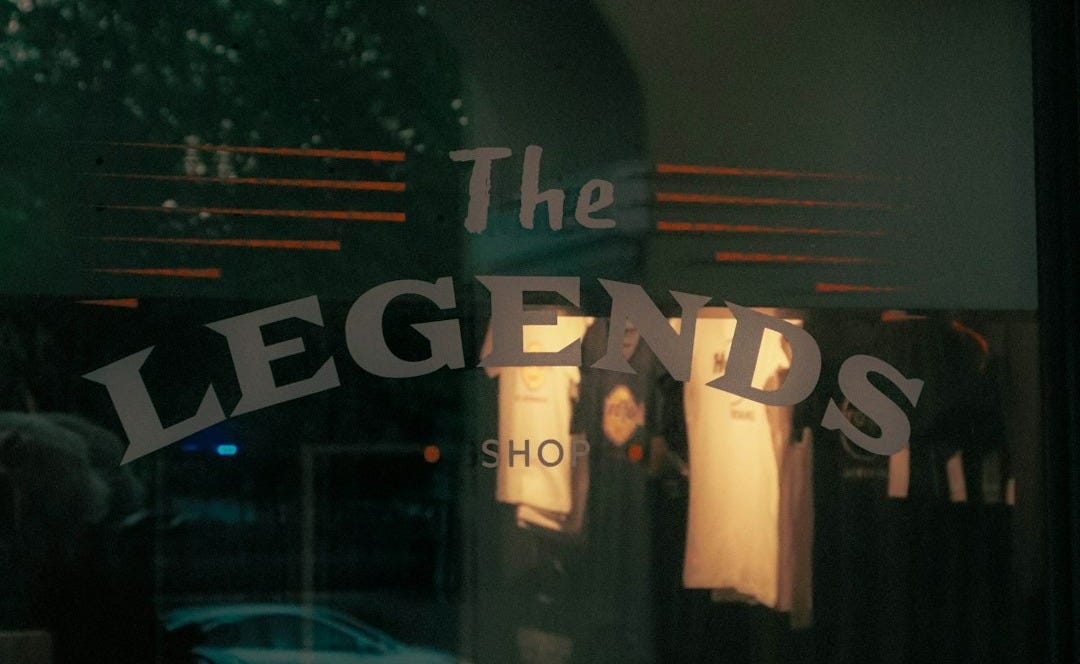 A store front with a sign that reads the legend's