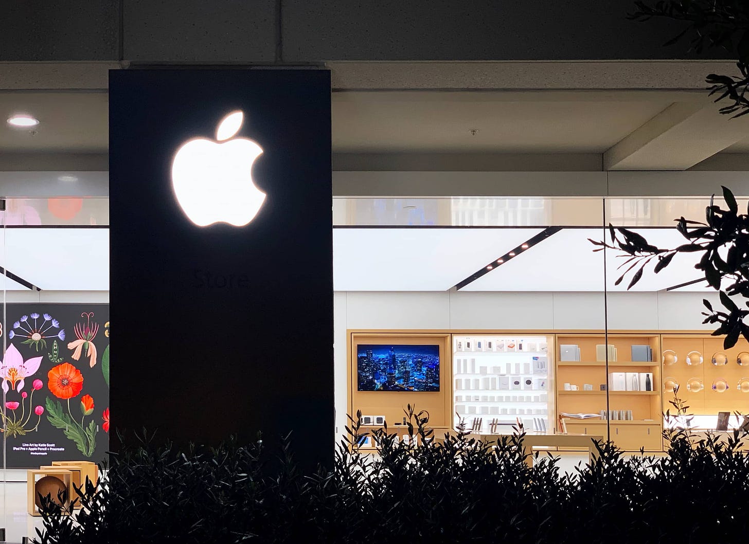 The Apple logo sign outside Apple Infinite Loop.