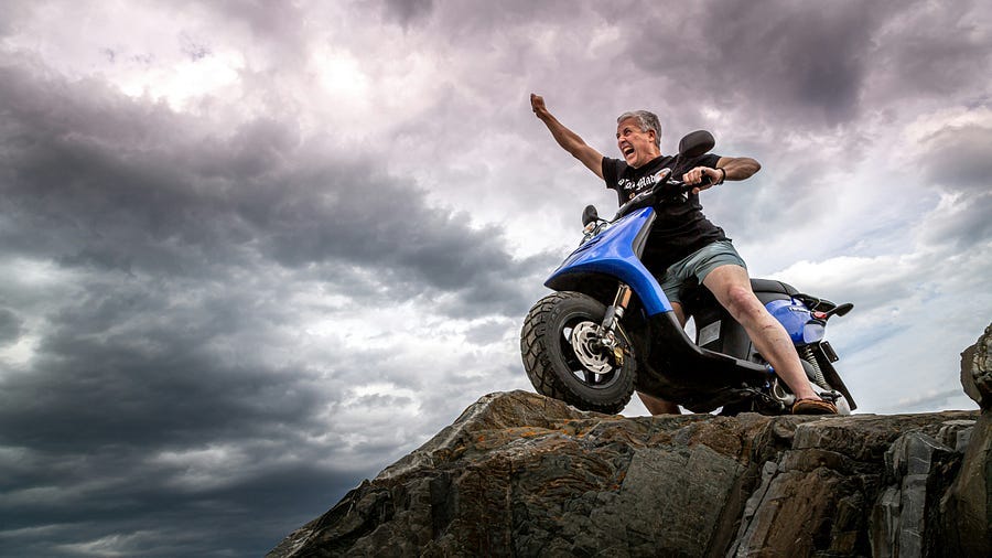 A victorious biker. A victorious biker.