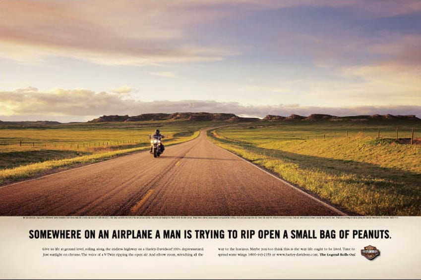 Harley-Davidson print ad with headline ‘Somewhere on an airplane a man is trying to rip open a small bag of peanuts.’