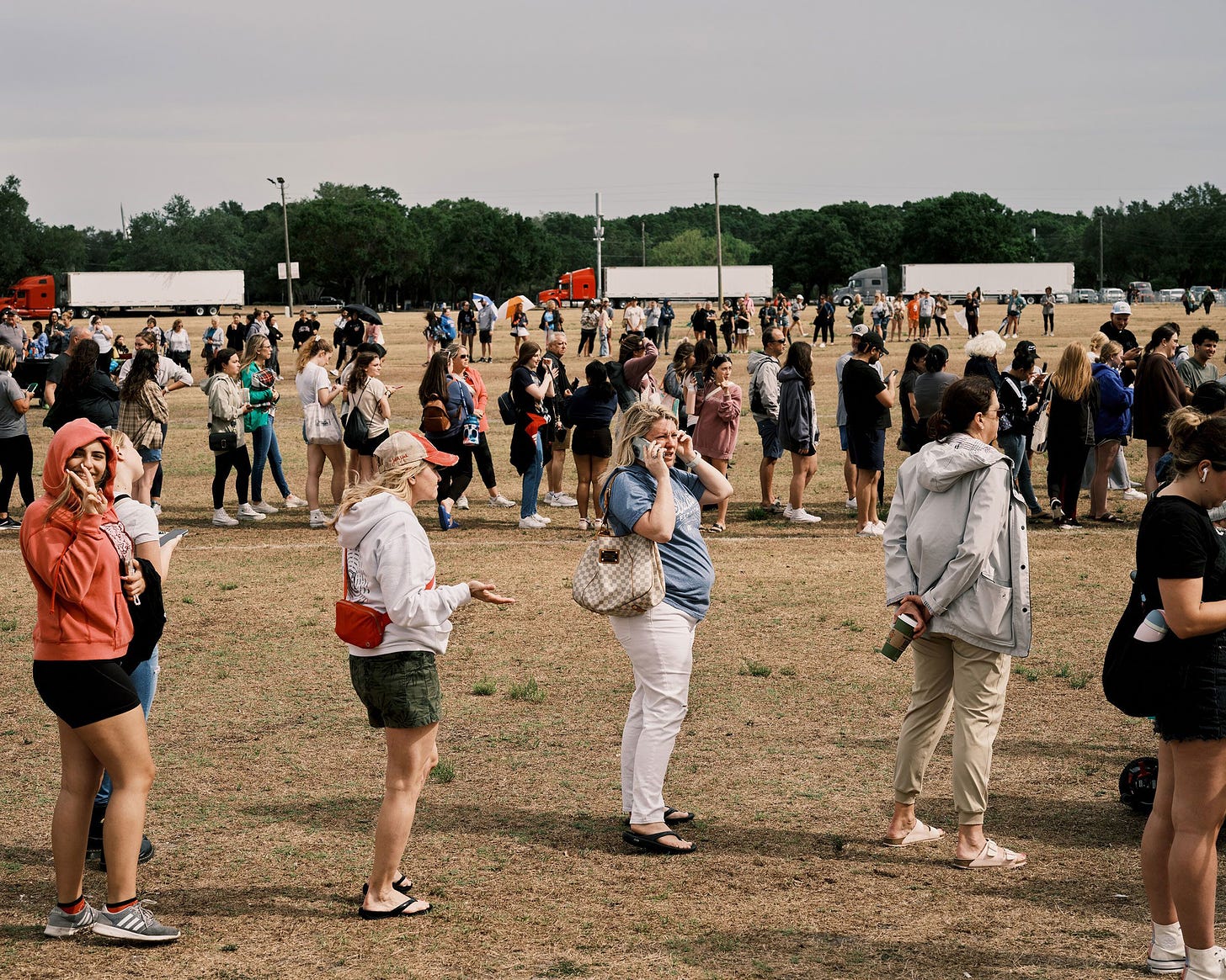 Fans wait in line to buy tour merchandise outside Raymond James Stadium in Tampa, Florida, on April 12.