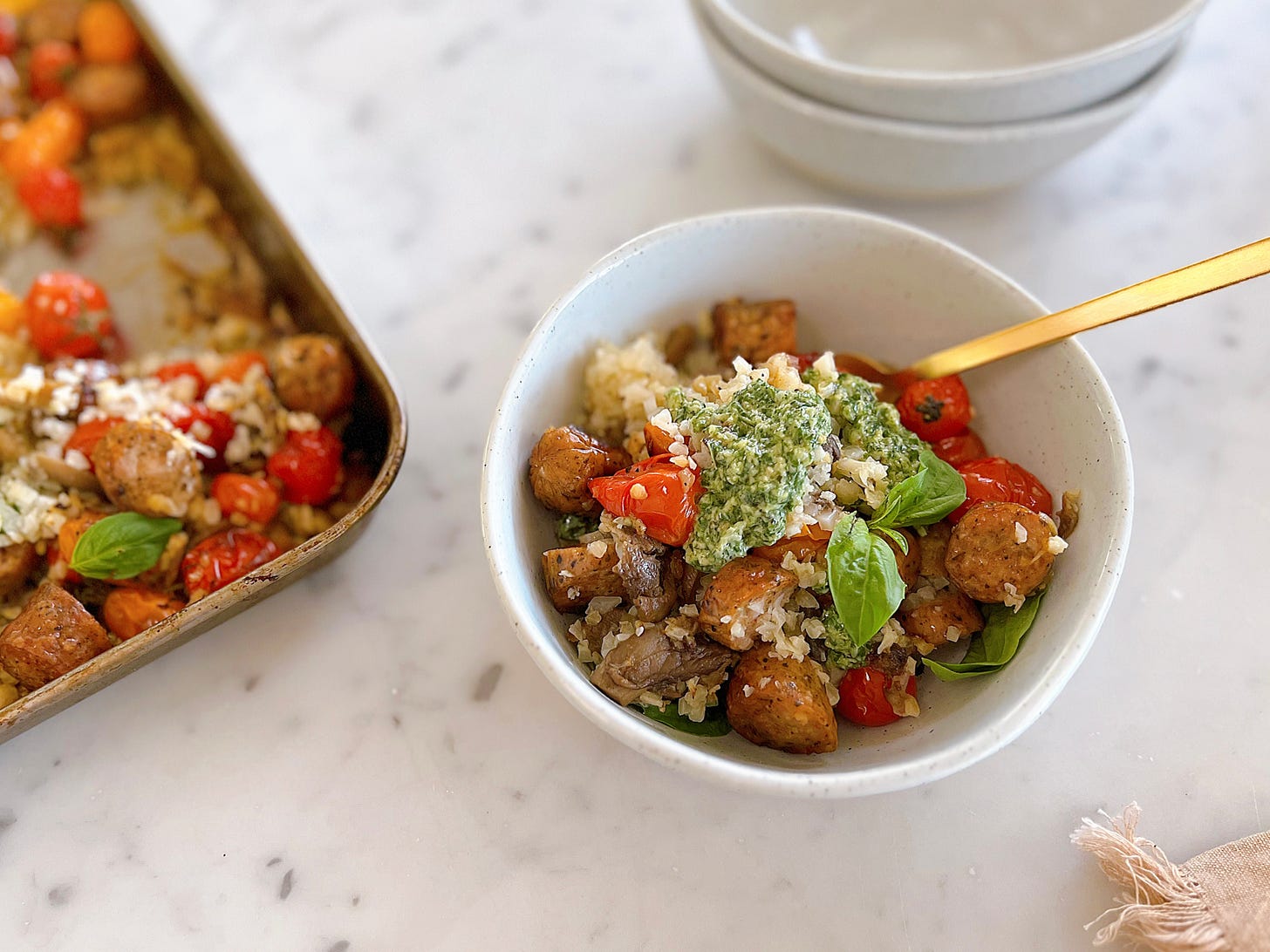 Bowl: Cauliflower Rice with Sausage, Mushrooms., and tomatoes with pesto aioli