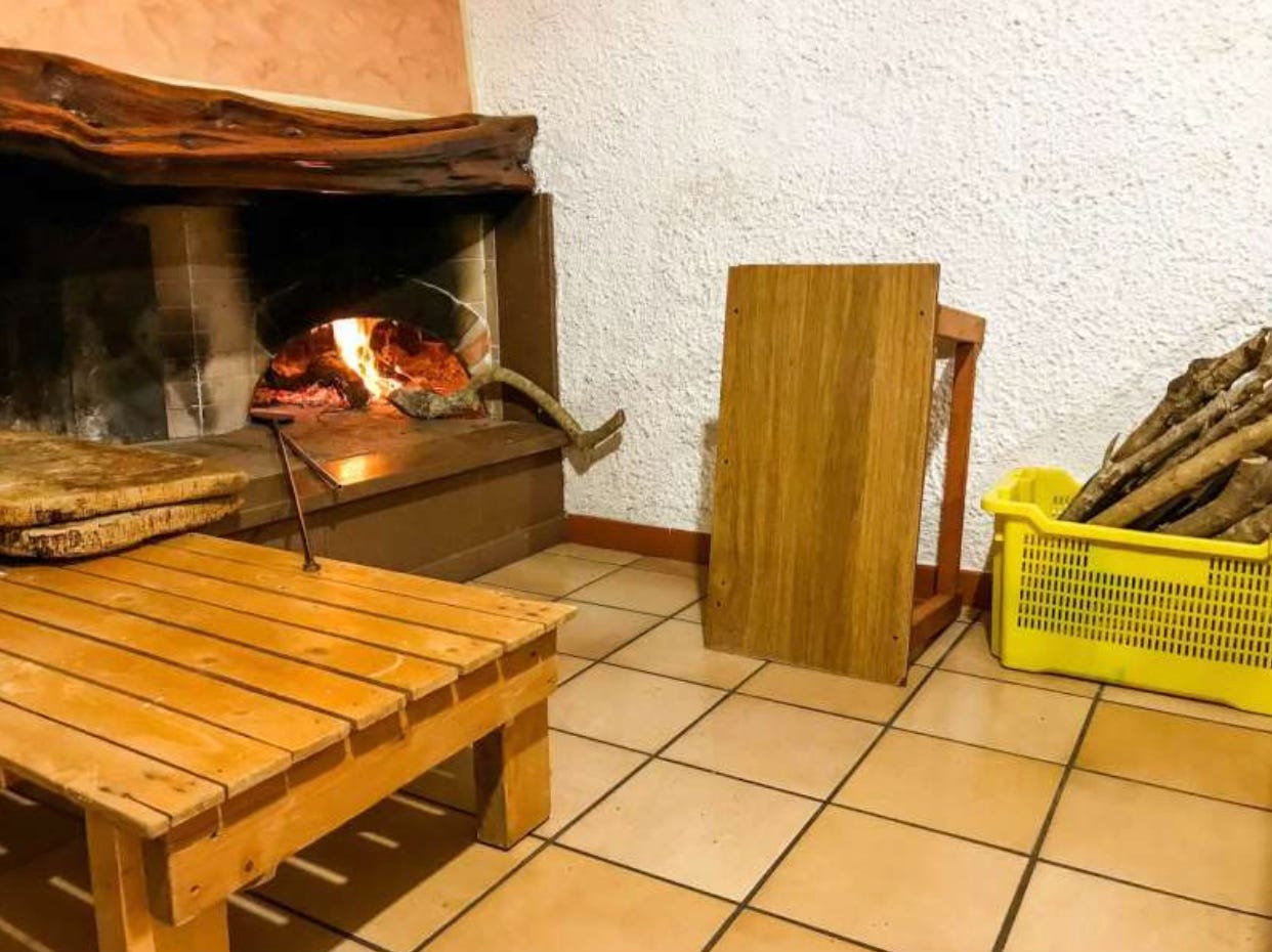 starting the first in a brick oven to make bread