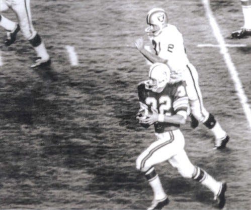  Figure 8: Joe Auer Returns Opening Kickoff for Touchdown