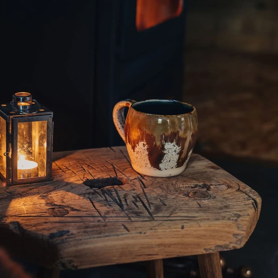 hand thrown mug in two tones of brown