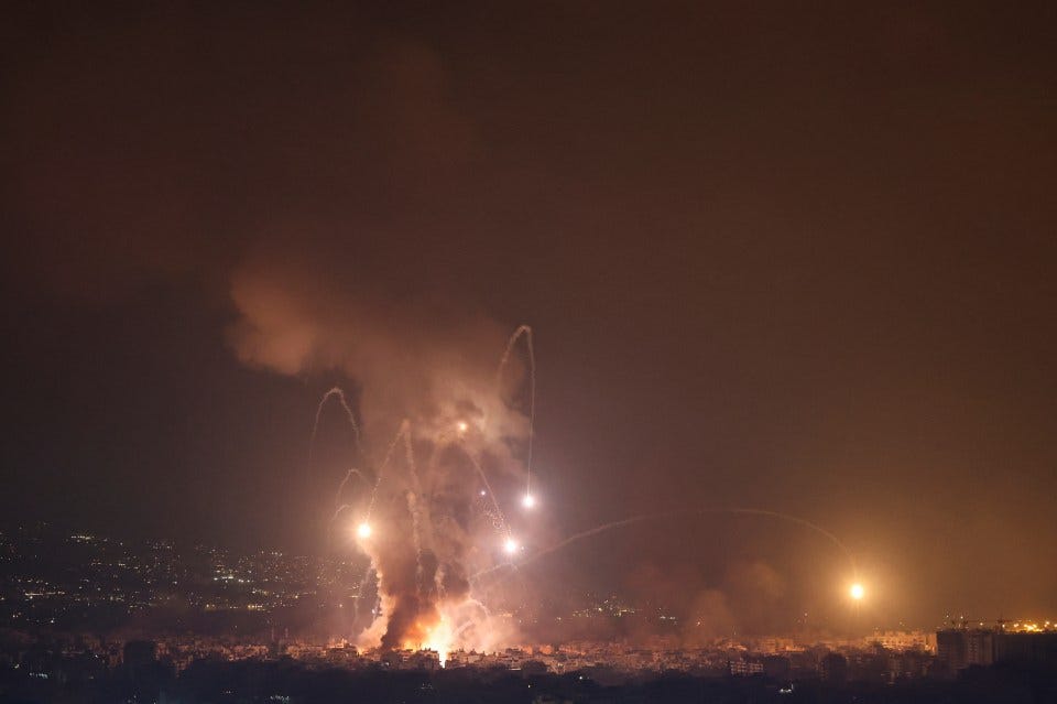 Smoke and flames rise in Beirut after the Israeli airstrike