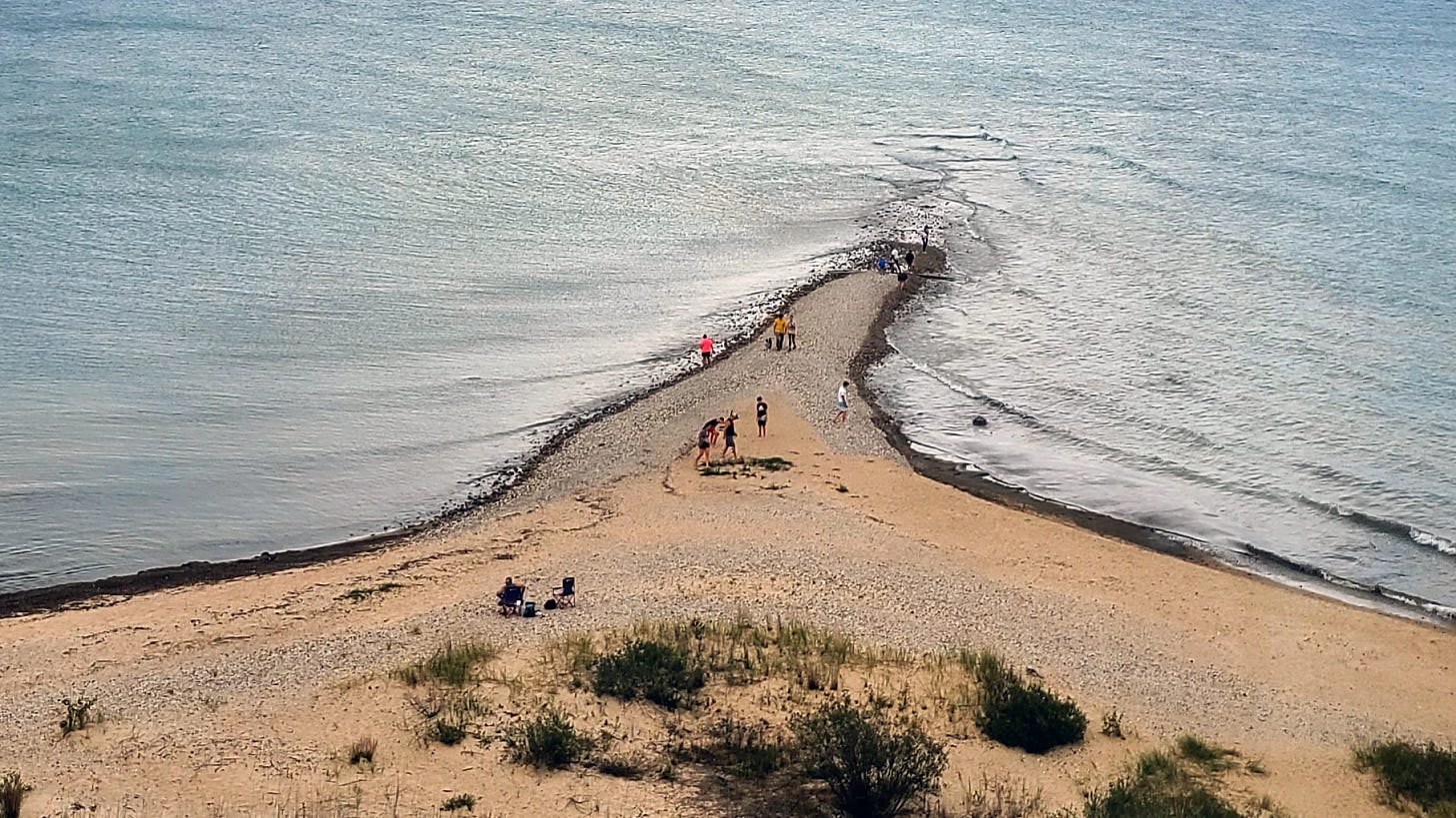 View from the Sturgeon Point lighthouse tower overlooking a reef on Lake Huron in Michigan